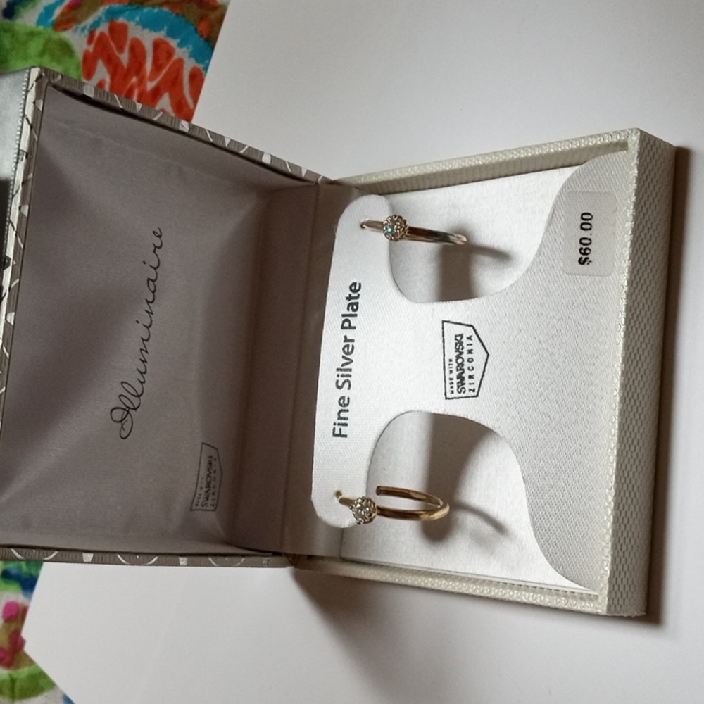 Silver earrings.